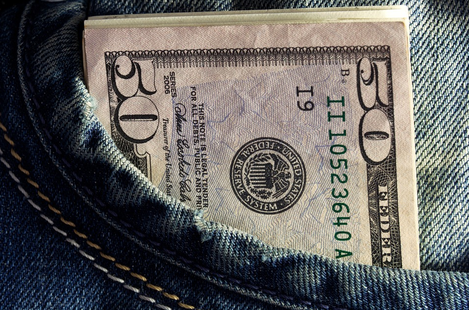 $50 bills in jeans pocket