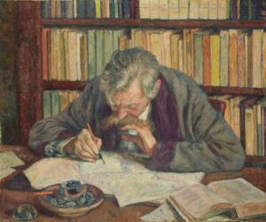 portrait of a man writing at a desk